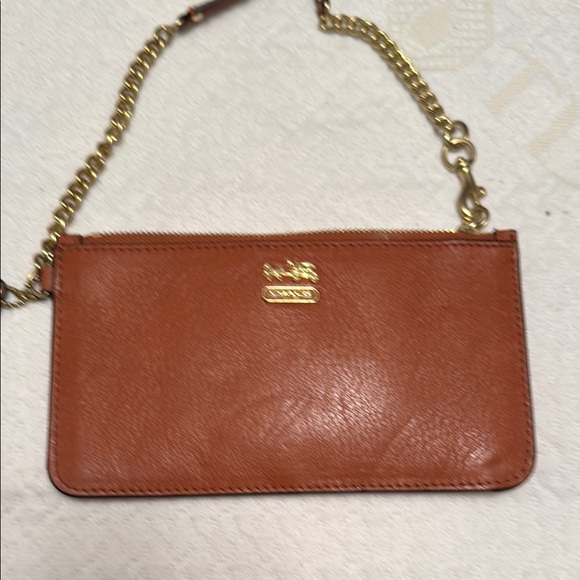 Coach Handbags - Coach Tan Leather Wristlet with Gold Chain